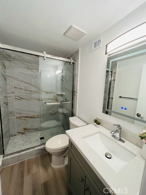 517 North Curtis Avenue, Unit E Alhambra, CA 91801 - Photo 18 of 34 a bathroom with a sink toilet and shower