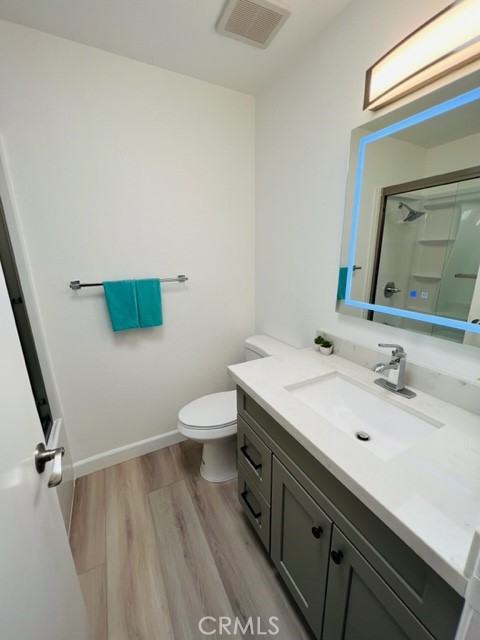 517 North Curtis Avenue, Unit E Alhambra, CA 91801 - Photo 24 of 34 a bathroom with a sink and a mirror