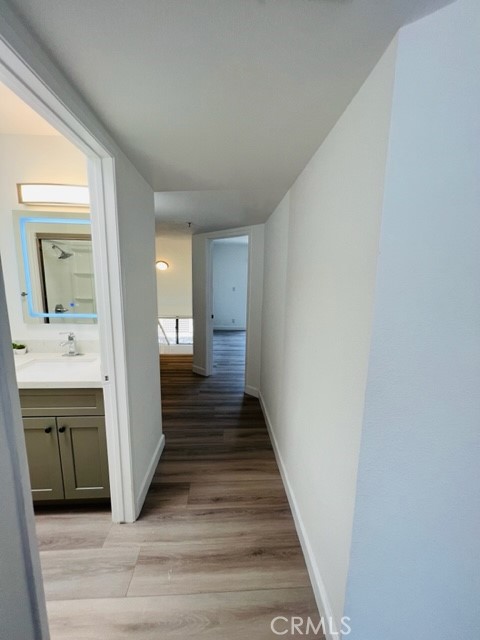 517 North Curtis Avenue, Unit E Alhambra, CA 91801 - Photo 27 of 34 a view of a hallway with wooden floor and staircase