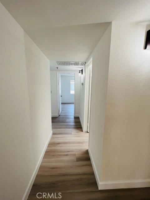 517 North Curtis Avenue, Unit E Alhambra, CA 91801 - Photo 31 of 34 a view of a hallway with wooden floor