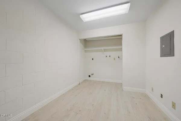 an aerial view of a house with a lake view