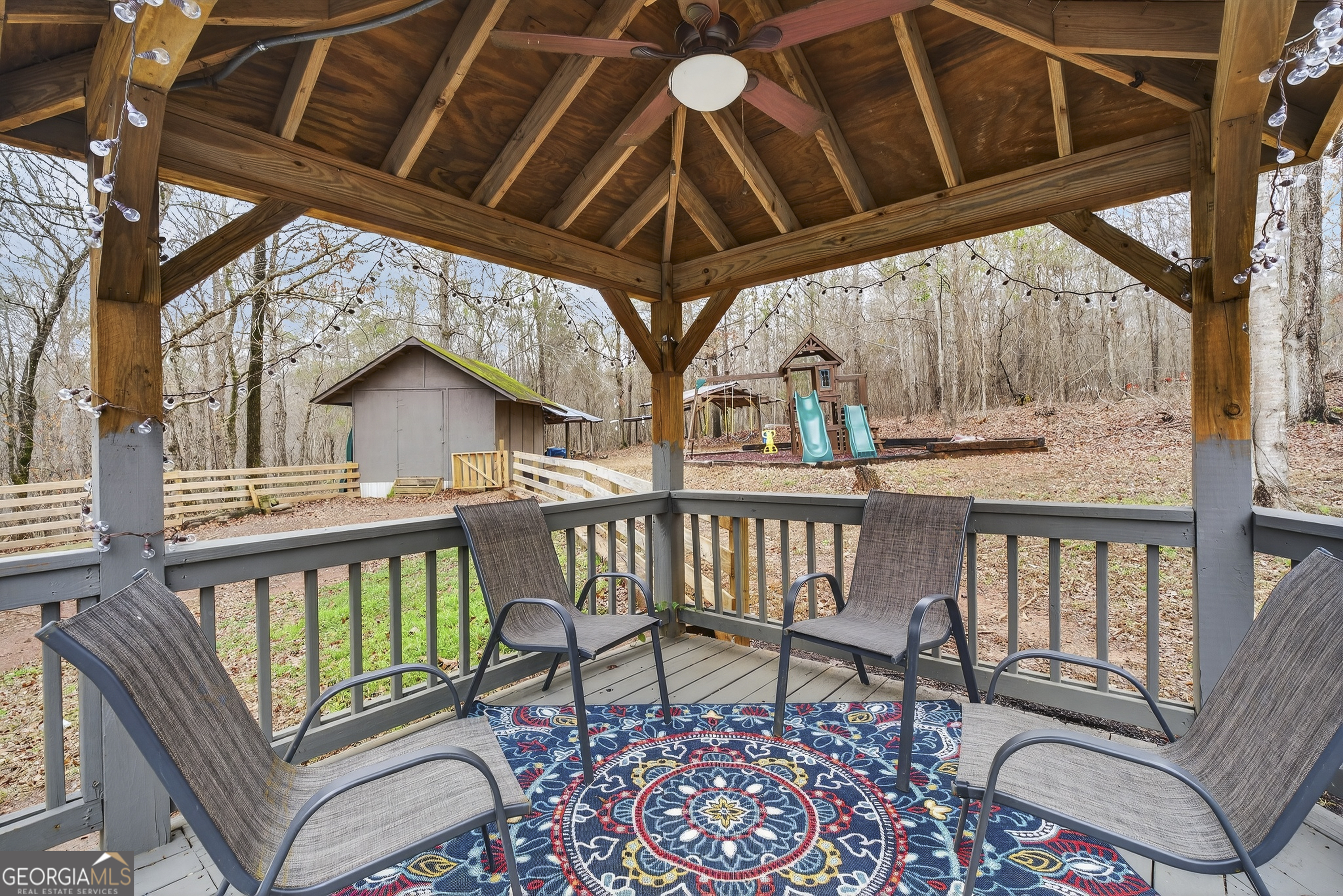 149 Forest Hill Road Southwest Milledgeville, GA 31061 - Photo 21 of 29 a view of a chairs and table in the balcony