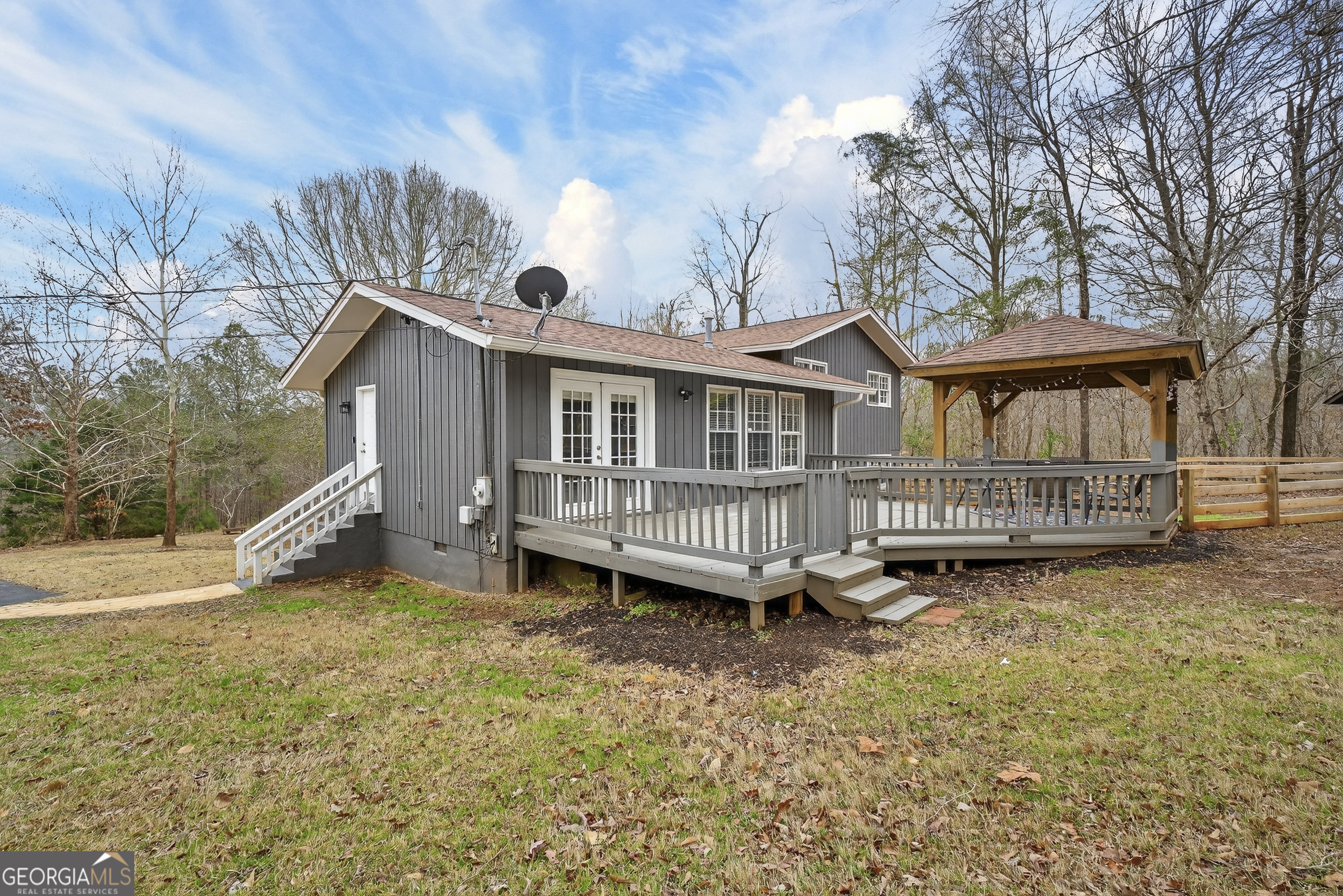149 Forest Hill Road Southwest Milledgeville, GA 31061 - Photo 23 of 29 a view of a house with a yard and sitting area