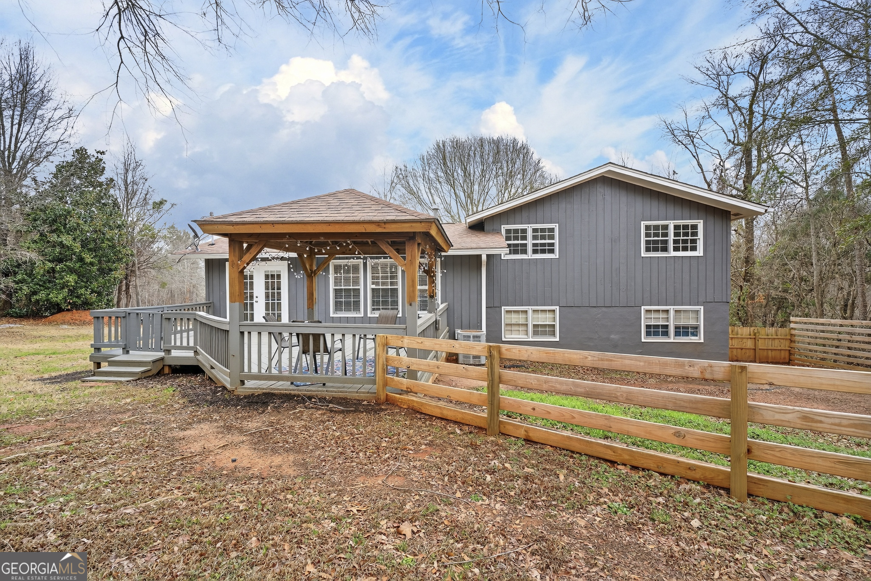 149 Forest Hill Road Southwest Milledgeville, GA 31061 - Photo 24 of 29 a front view of a house with garden