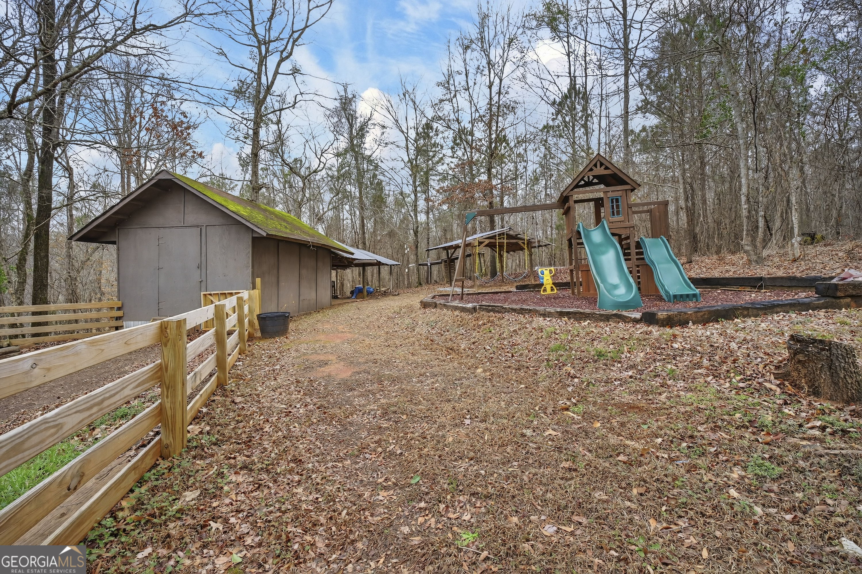 149 Forest Hill Road Southwest Milledgeville, GA 31061 - Photo 26 of 29 a view of outdoor space with playground and green space