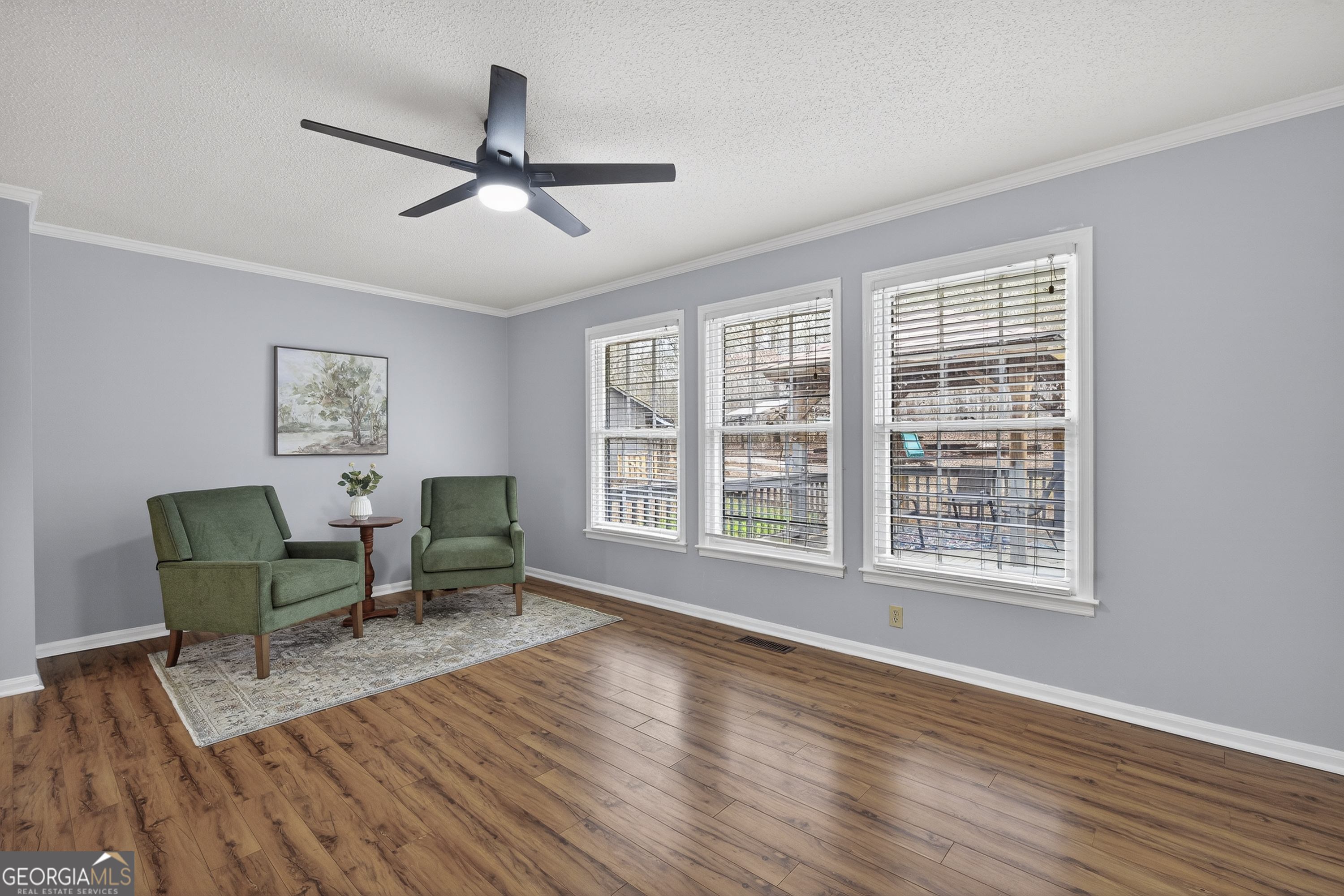 149 Forest Hill Road Southwest Milledgeville, GA 31061 - Photo 6 of 29 a living room with furniture and a window