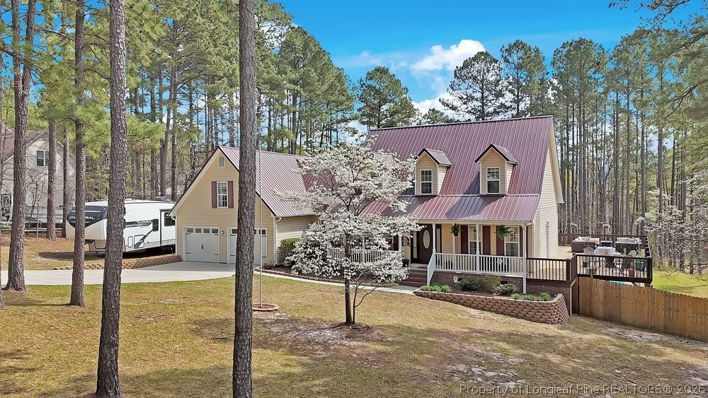 419 Senter Lane Bunnlevel, NC 28323 - Photo 2 of 49 a view of houses with sky view
