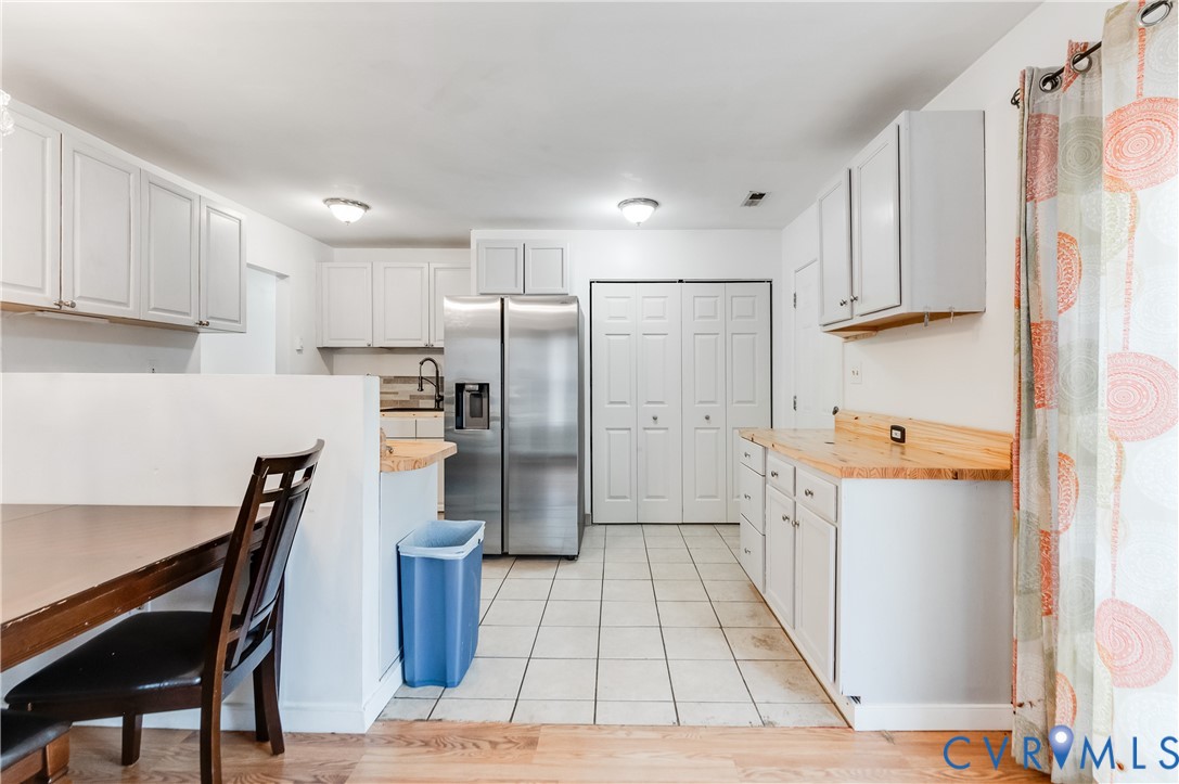 5724 Linda Road Sandston, VA 23150 - Photo 12 of 35 a kitchen with stainless steel appliances a refrigerator and a stove top oven