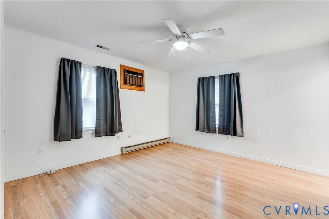 5724 Linda Road Sandston, VA 23150 - Photo 24 of 35 a view of a room with wooden floor and white walls