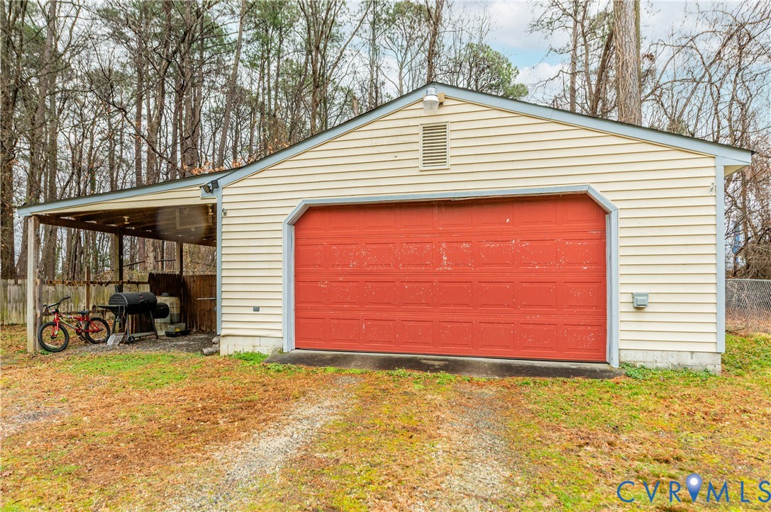 5724 Linda Road Sandston, VA 23150 - Photo 30 of 35 a front view of a house with a yard