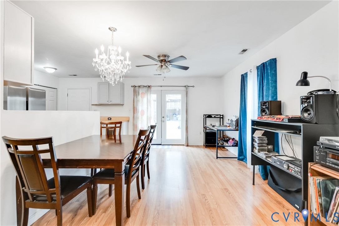 5724 Linda Road Sandston, VA 23150 - Photo 9 of 35 a view of a dining room with furniture and wooden floor