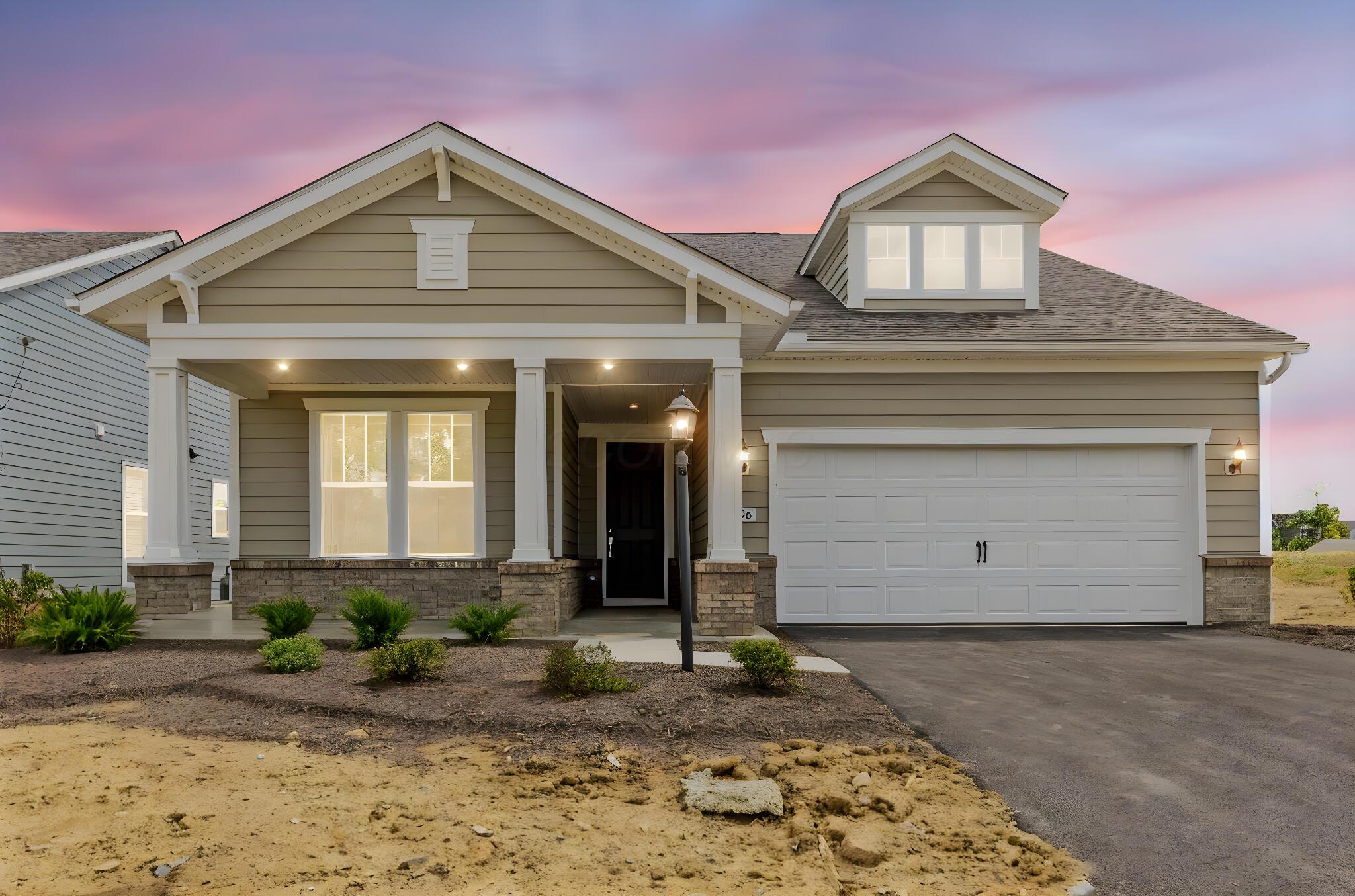 706 Oldcastle Road, Unit LOT 77 Lewis Center, OH 43035 - Photo 36 of 38 Front Exterior Twilight