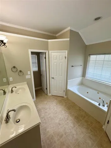a bathroom with a sink and a tub