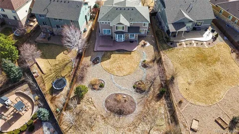 an aerial view of a house with swimming pool