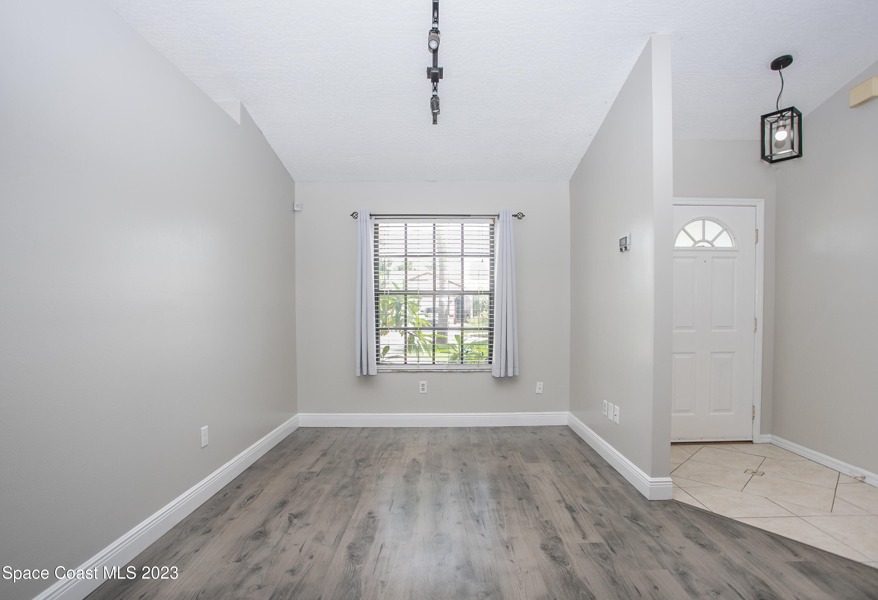 1679 Palm Ridge Road Melbourne, FL 32935 - Photo 6 of 28 Formal Dining_Entry