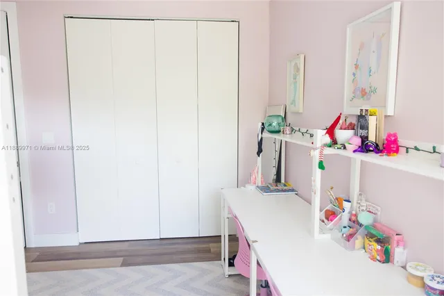 a room with a baby bed