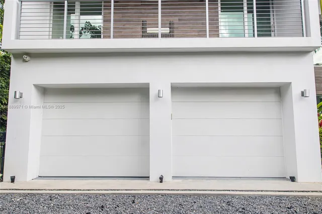 a view of wooden cabinets and a window