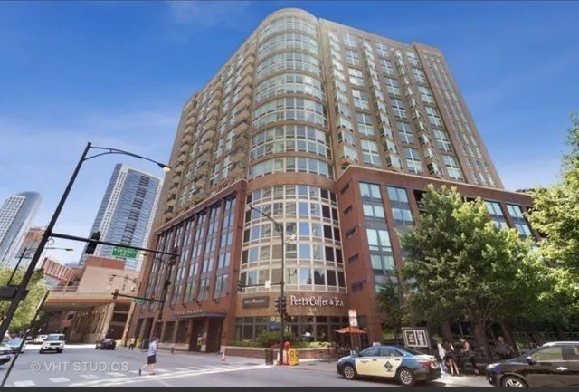 a tall building sitting on the side of a street