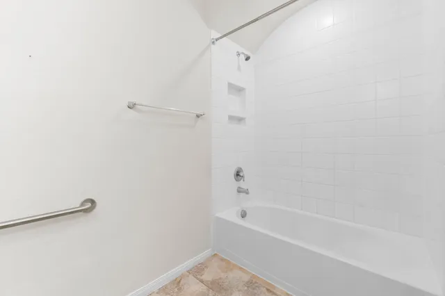 a bathroom with a bathtub