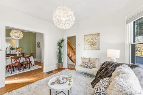 a spacious bedroom with a bed and a table in it