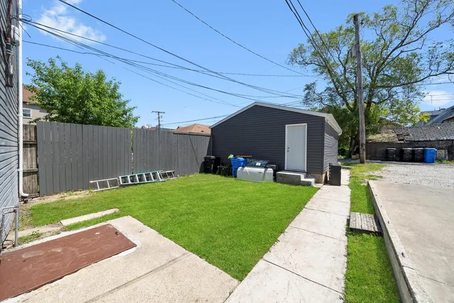 a backyard of a house with seating space