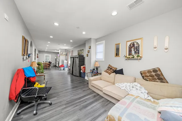 a living room with furniture and a couch