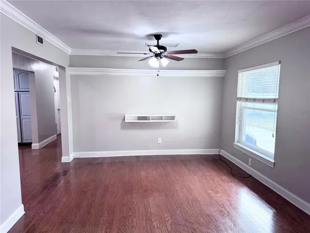 a kitchen with stainless steel appliances a refrigerator sink and cabinets