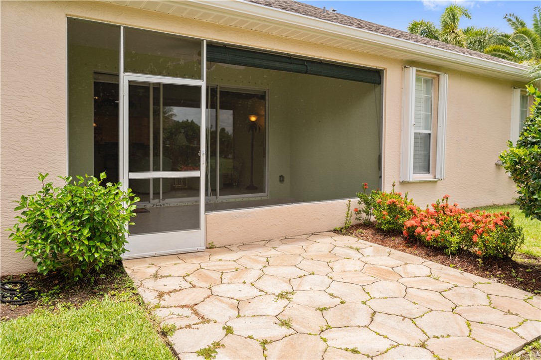 412 North Tangerine Square Southwest Vero Beach, FL 32968 - Photo 23 of 35 a house with a outdoor space