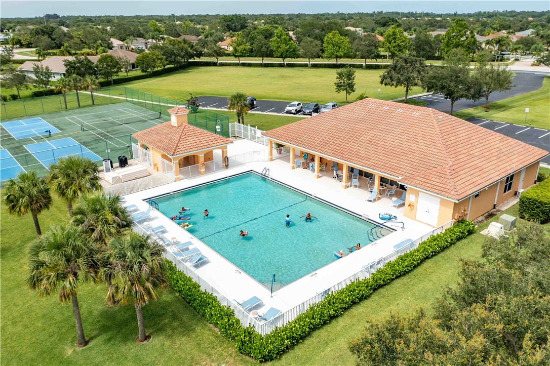 412 North Tangerine Square Southwest Vero Beach, FL 32968 - Photo 34 of 35 an aerial view of a house with a lake view