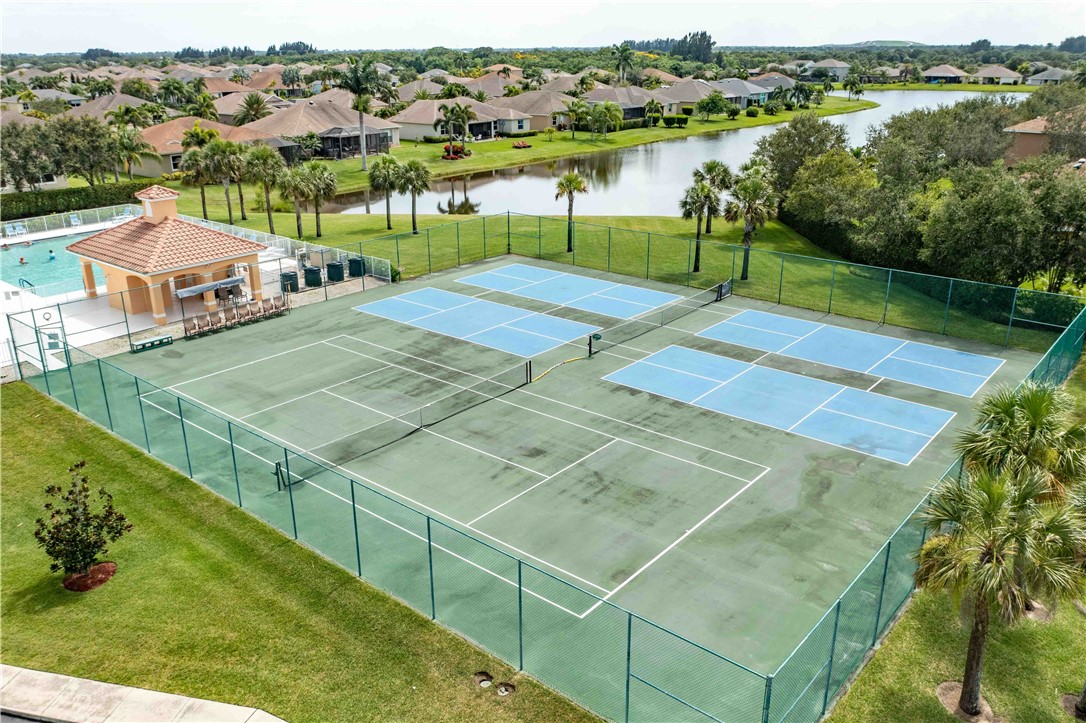 412 North Tangerine Square Southwest Vero Beach, FL 32968 - Photo 35 of 35 a view of a lake with houses