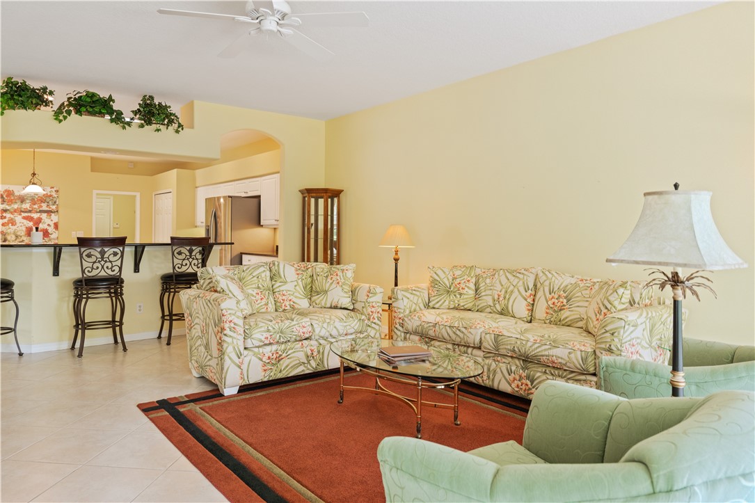 412 North Tangerine Square Southwest Vero Beach, FL 32968 - Photo 4 of 35 a living room with furniture