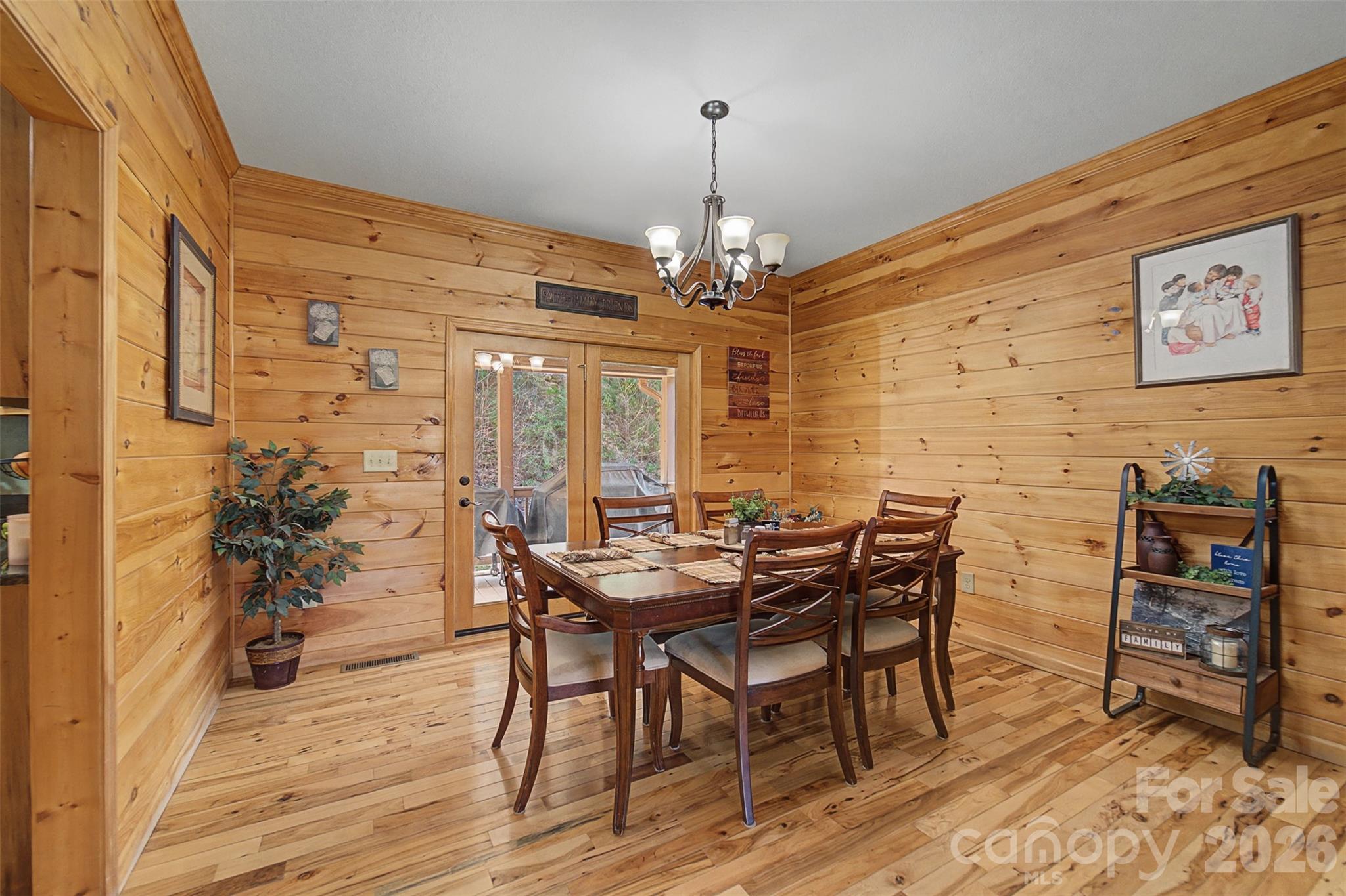 1960 Atoah Road Robbinsville, NC 28771 - Photo 12 of 48 a view of a dining room with furniture and chandelier