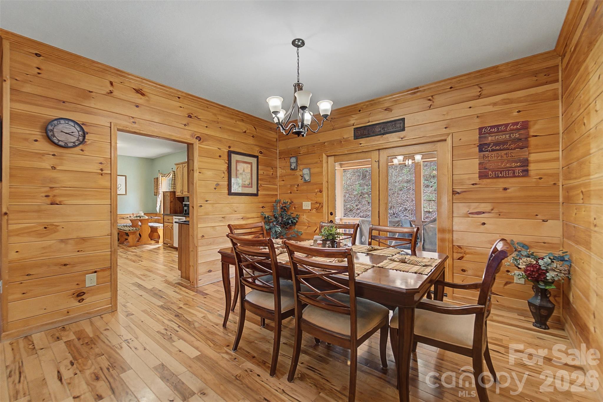1960 Atoah Road Robbinsville, NC 28771 - Photo 13 of 48 a view of a dining room with furniture and wooden floor