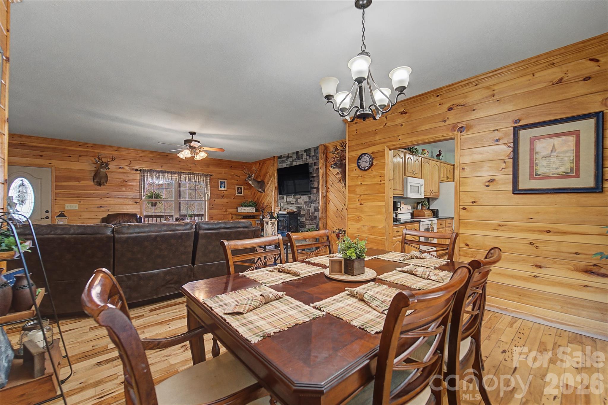 1960 Atoah Road Robbinsville, NC 28771 - Photo 14 of 48 a dining room with a wooden table and chairs