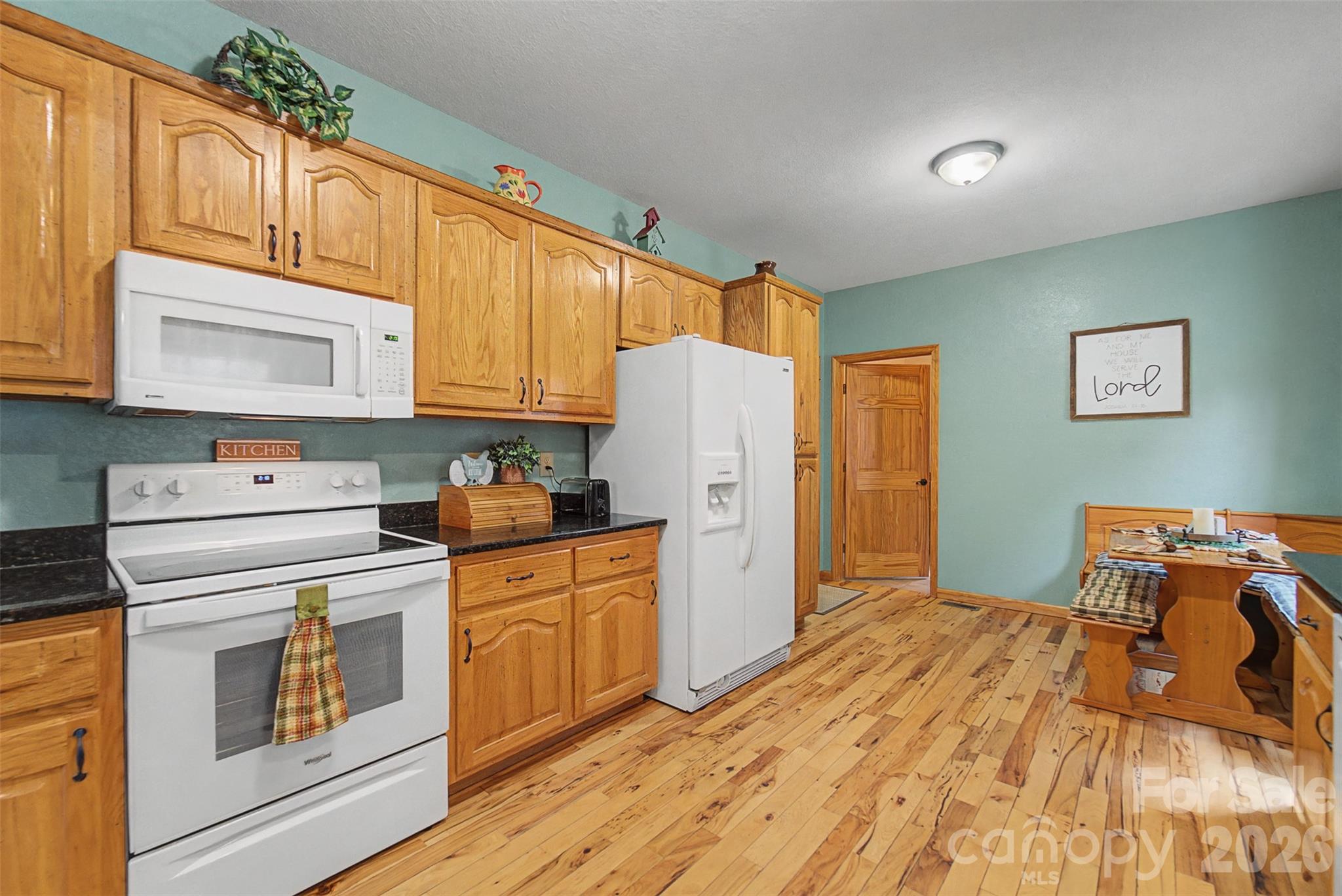 1960 Atoah Road Robbinsville, NC 28771 - Photo 16 of 48 a kitchen with a refrigerator stove and sink