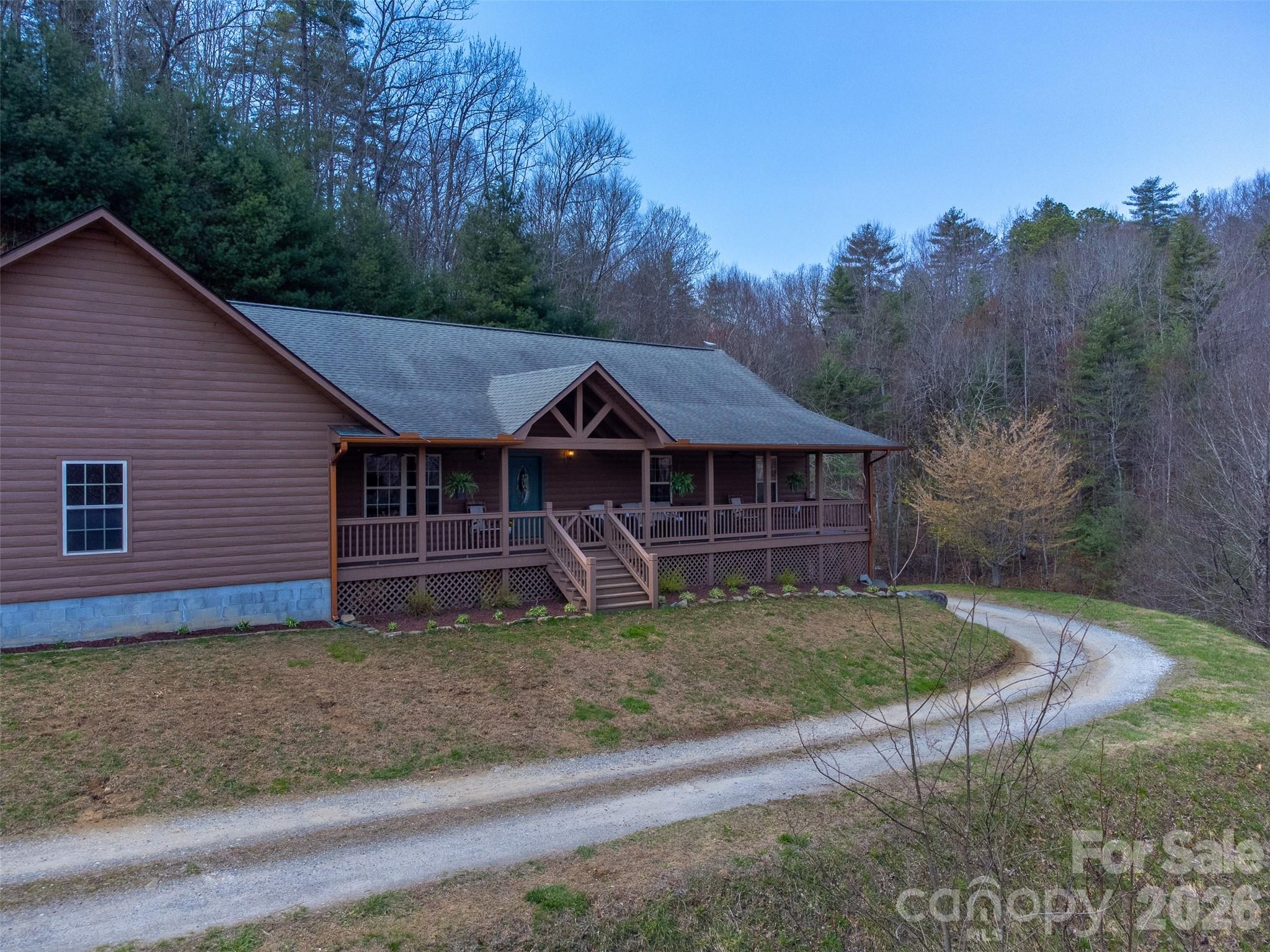 1960 Atoah Road Robbinsville, NC 28771 - Photo 2 of 48 a view of a house with a yard
