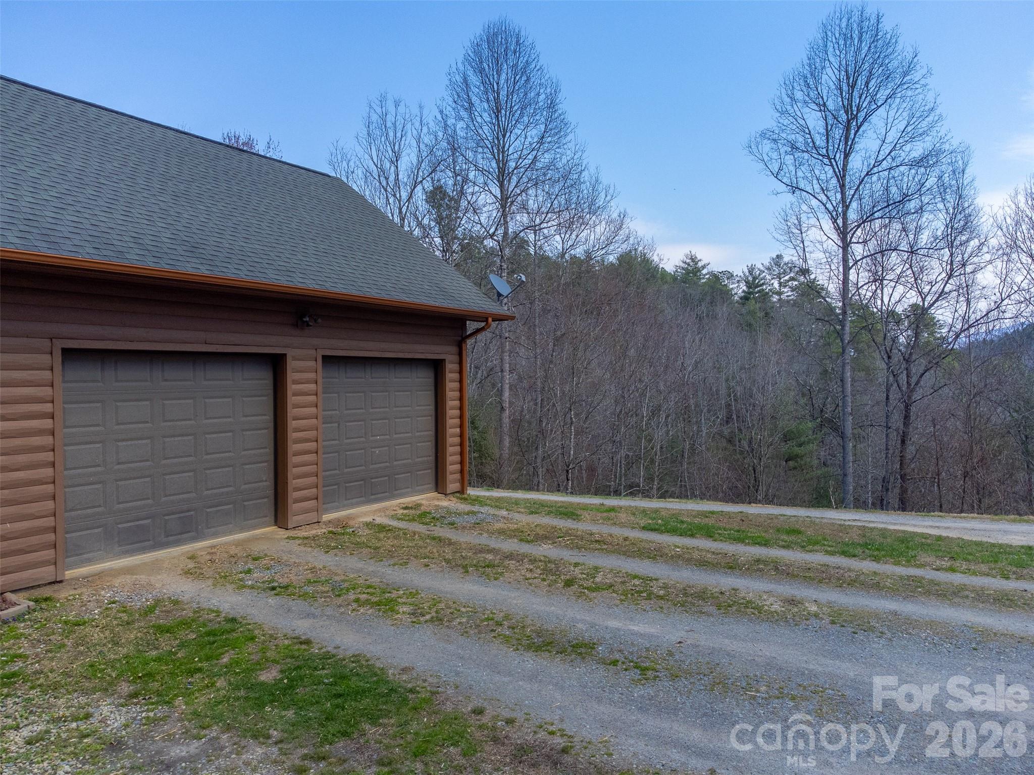 1960 Atoah Road Robbinsville, NC 28771 - Photo 40 of 48 a house with a outdoor space