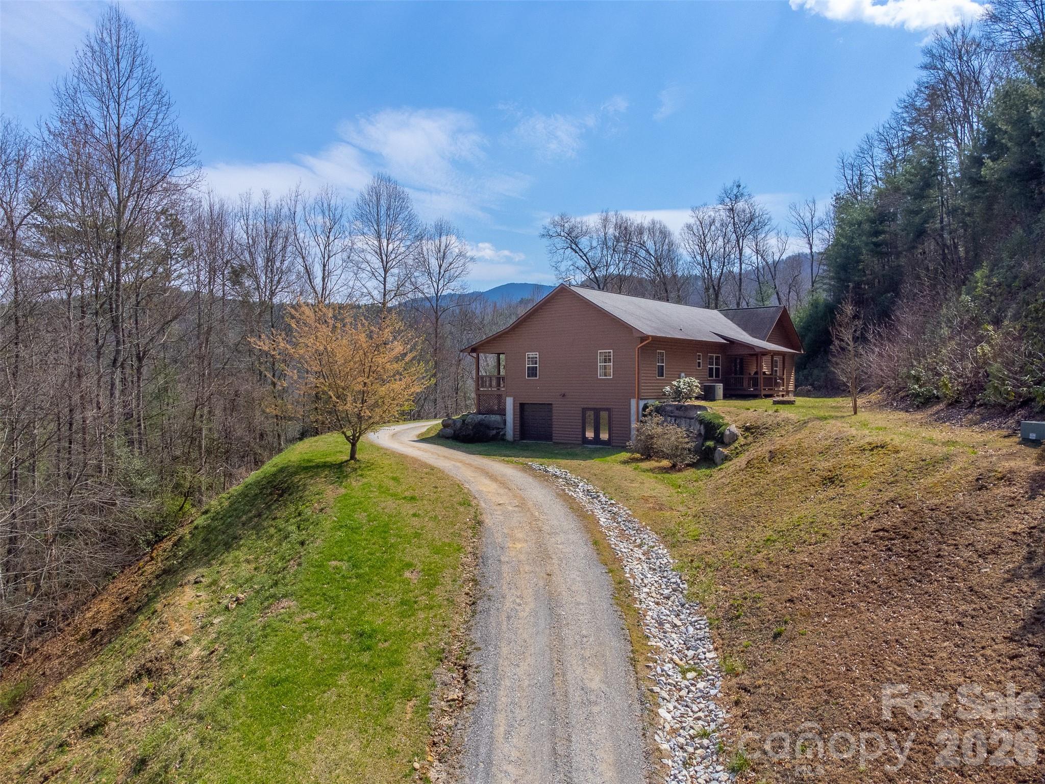 1960 Atoah Road Robbinsville, NC 28771 - Photo 5 of 48 a house view with a outdoor space