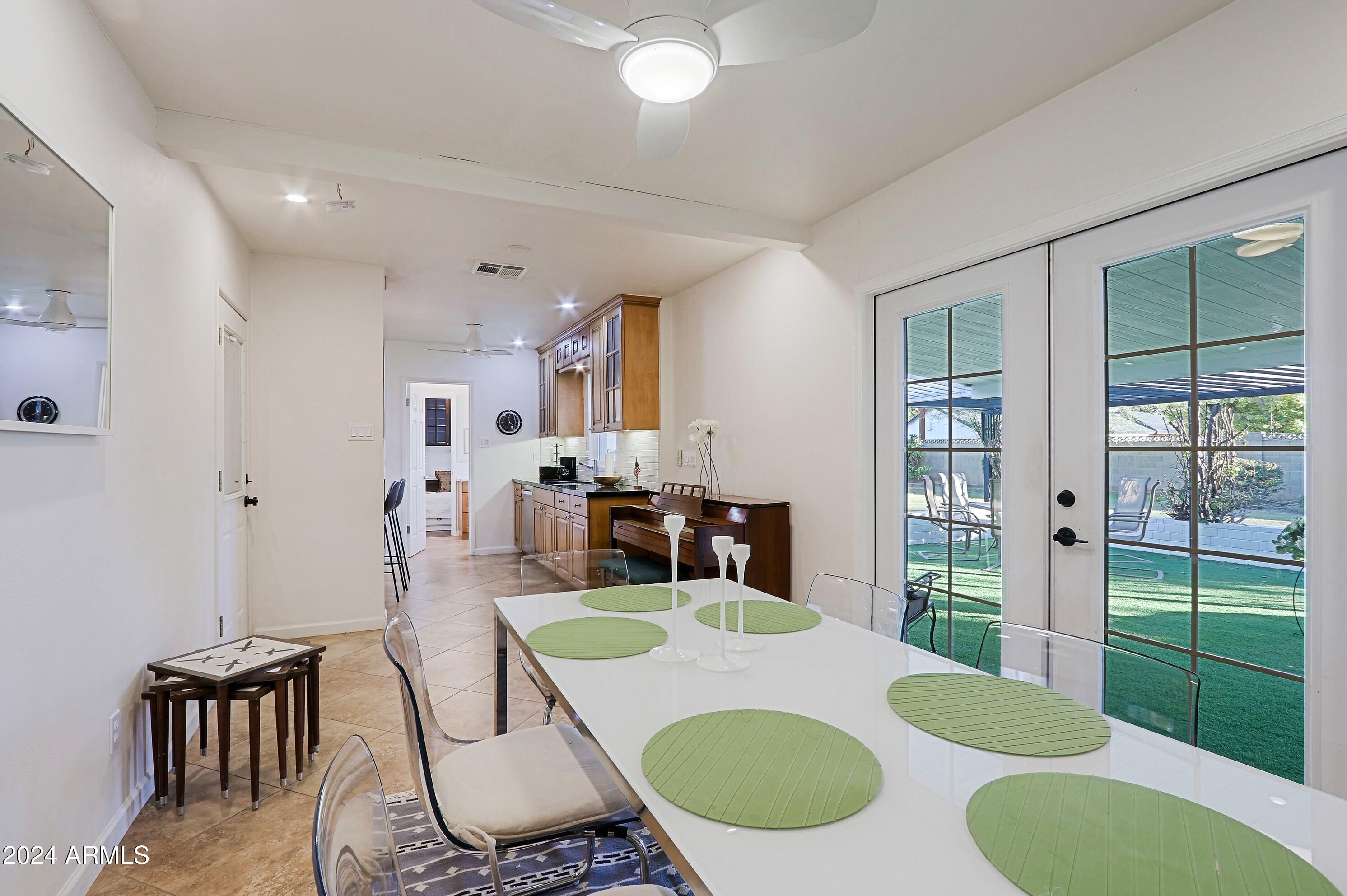 4645 East Windsor Avenue Phoenix, AZ 85008 - Photo 14 of 33 a living room with furniture and a table