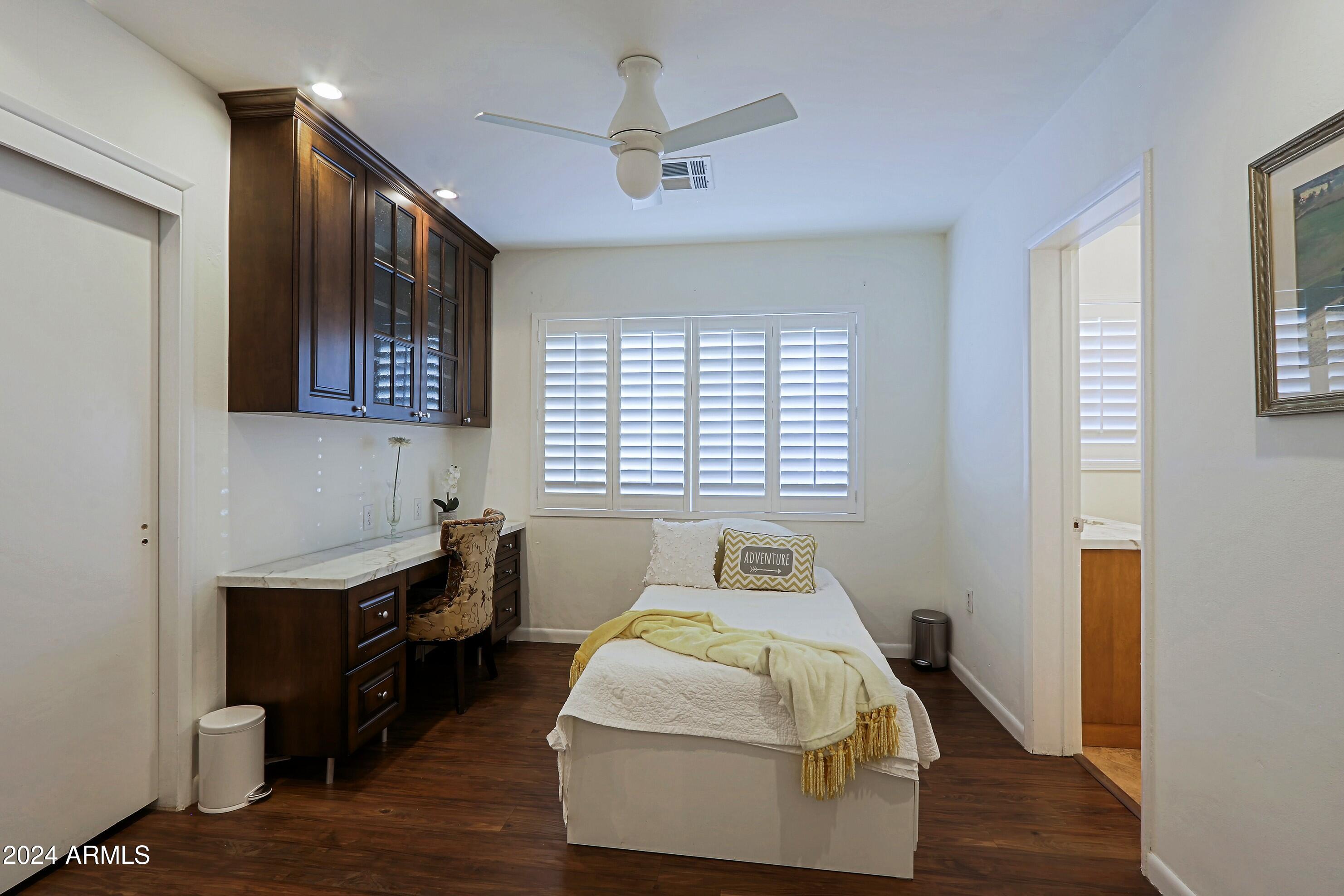 4645 East Windsor Avenue Phoenix, AZ 85008 - Photo 25 of 33 a bed room with a bed and a window