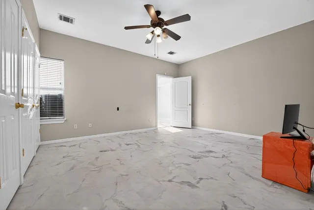 a view of workspace with livingroom view