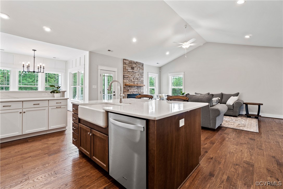 Lot 44 Wendenburg Circle, Unit SPEC Aylett, VA 23009 - Photo 12 of 19 a kitchen with kitchen island granite countertop a sink cabinets and wooden floor