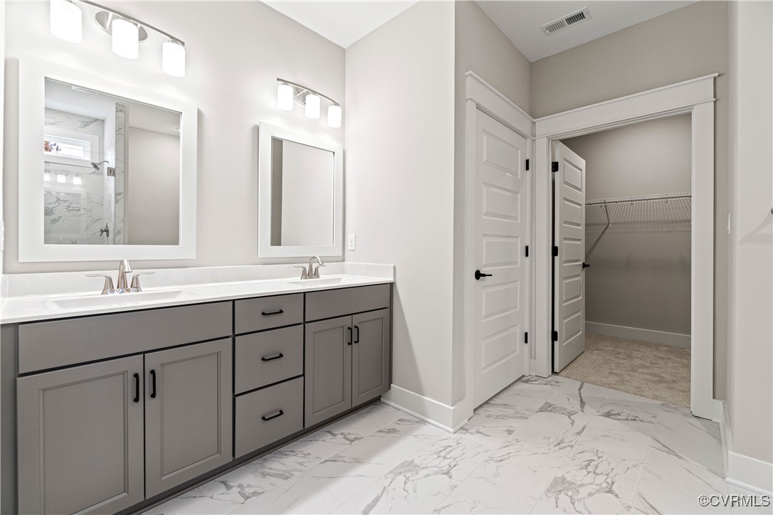 Lot 44 Wendenburg Circle, Unit SPEC Aylett, VA 23009 - Photo 15 of 19 a bathroom with a shower sink and mirror