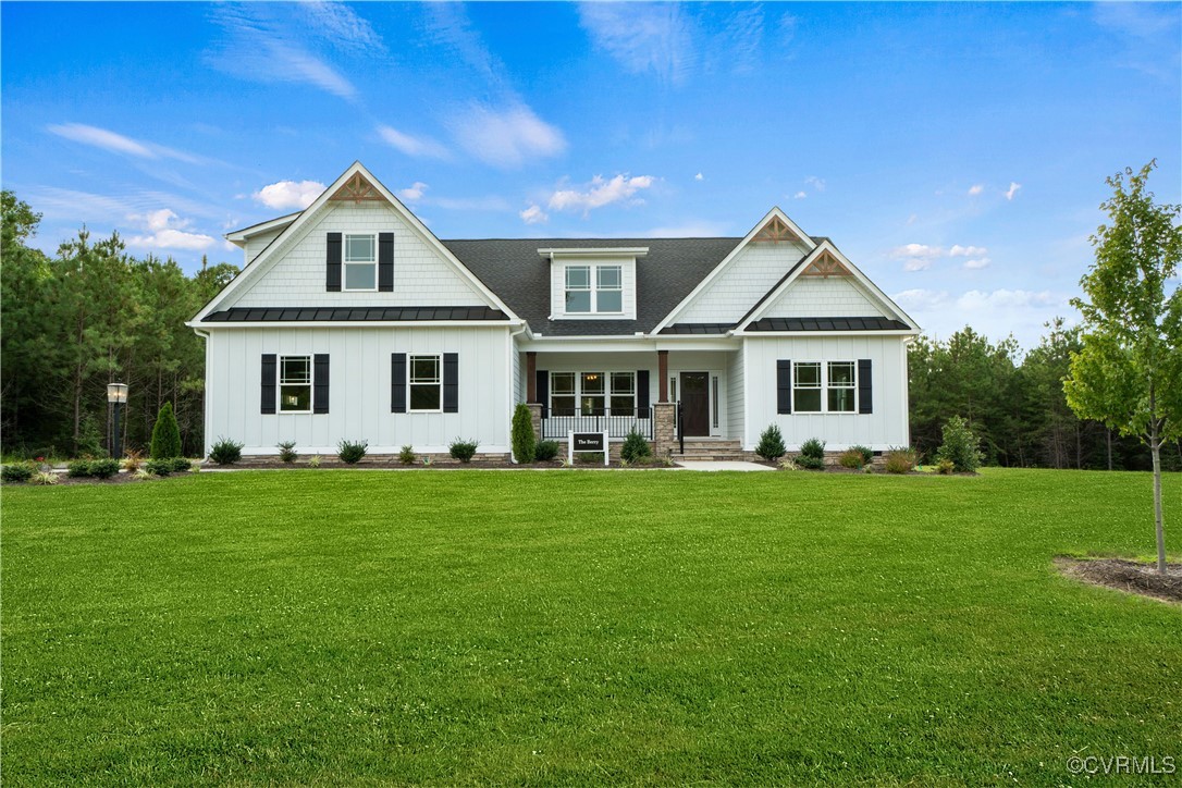Lot 44 Wendenburg Circle, Unit SPEC Aylett, VA 23009 - Photo 4 of 19 a front view of a house with a garden