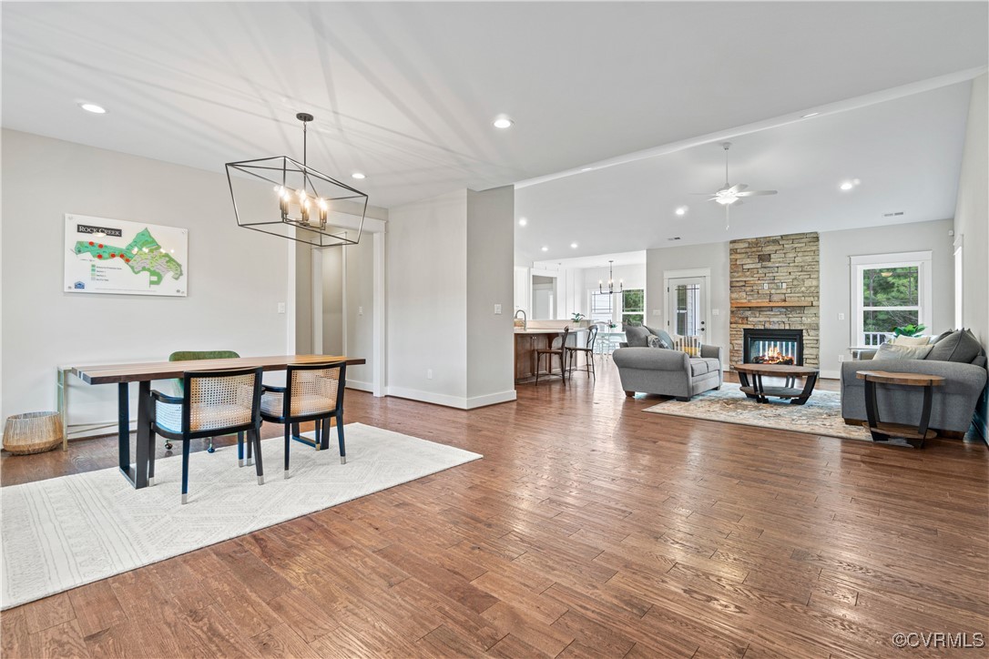 Lot 44 Wendenburg Circle, Unit SPEC Aylett, VA 23009 - Photo 6 of 19 a view of a dining room and livingroom with furniture wooden floor a chandelier
