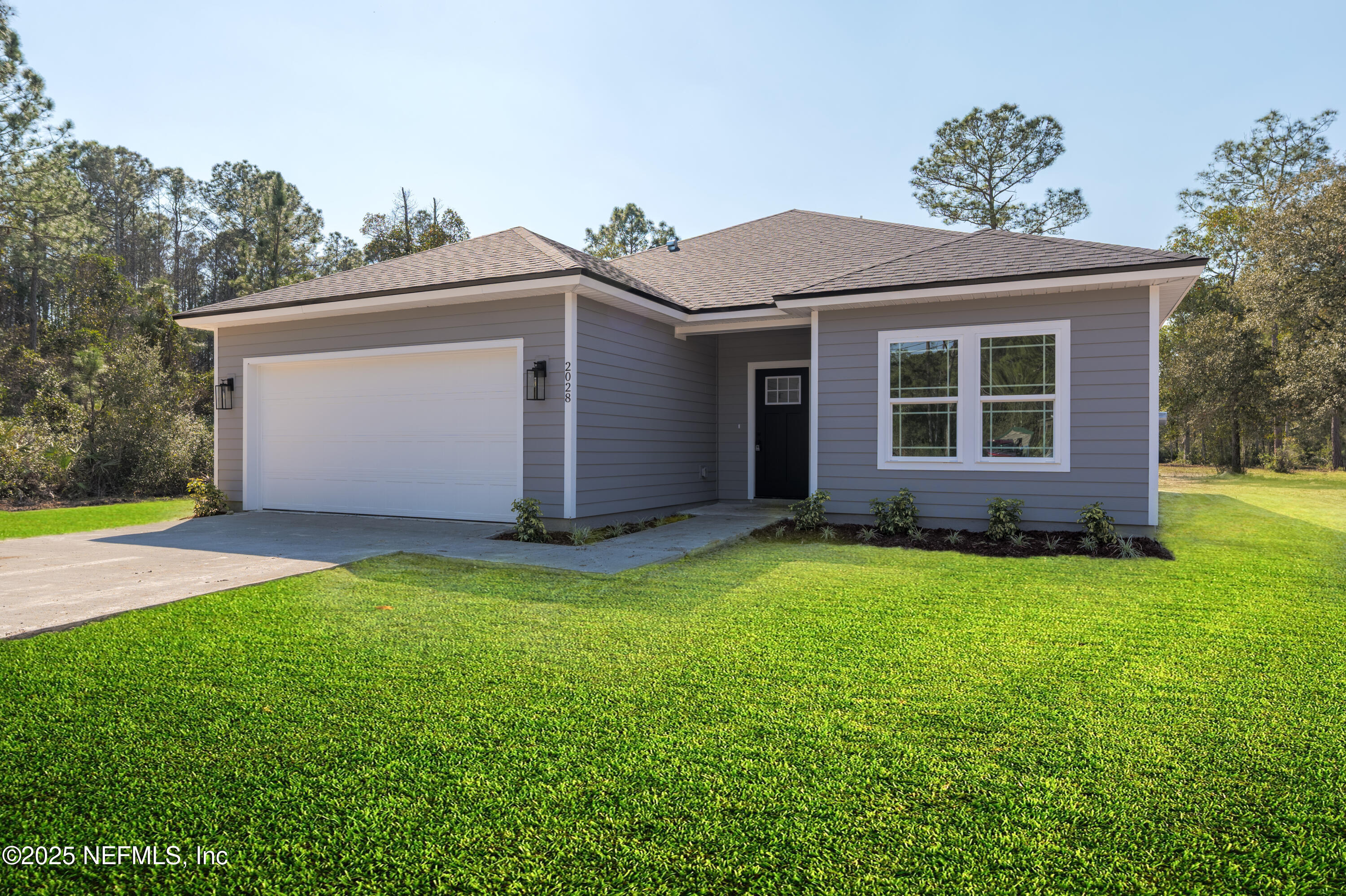a view of a house with garden