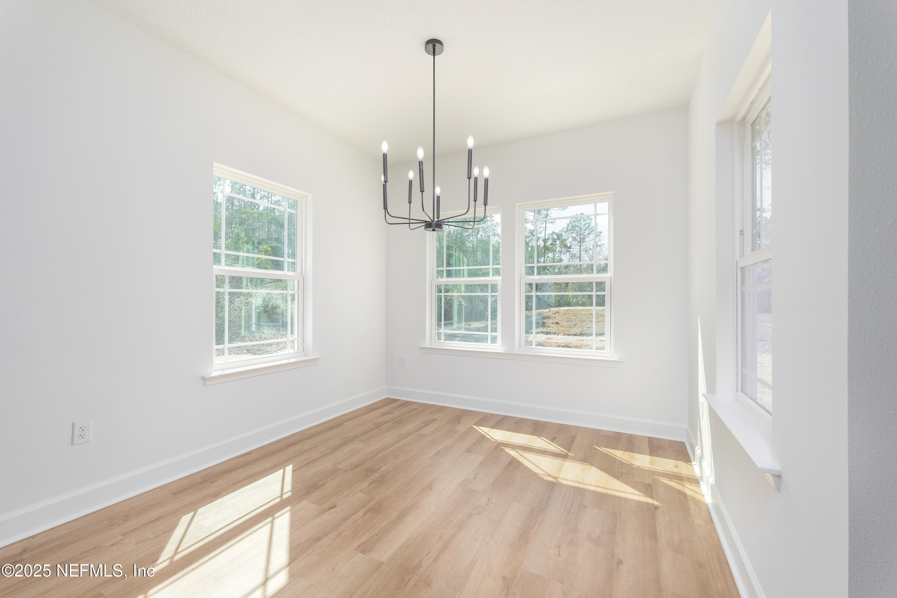 5214 County Road 218 Middleburg, FL 32068 - Photo 13 of 30 a view of an empty room with windows