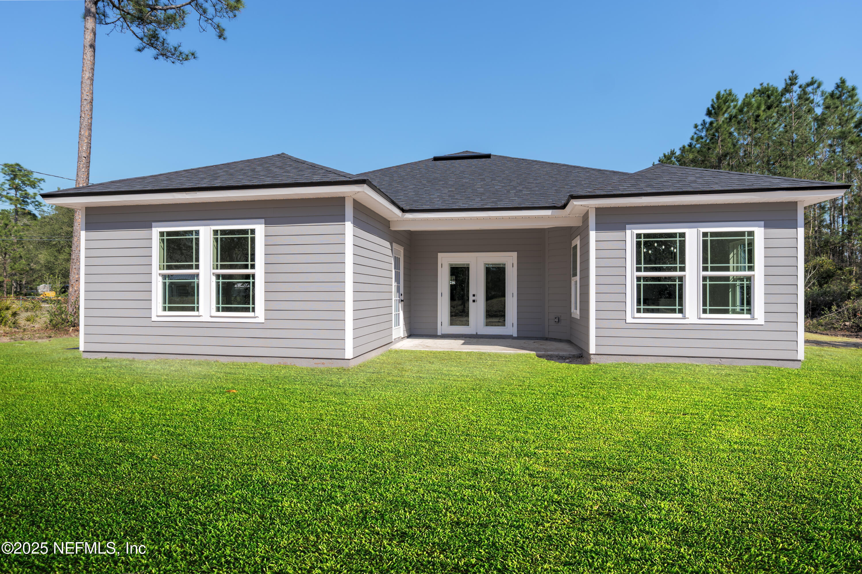 5214 County Road 218 Middleburg, FL 32068 - Photo 29 of 30 a front view of a house with a garden
