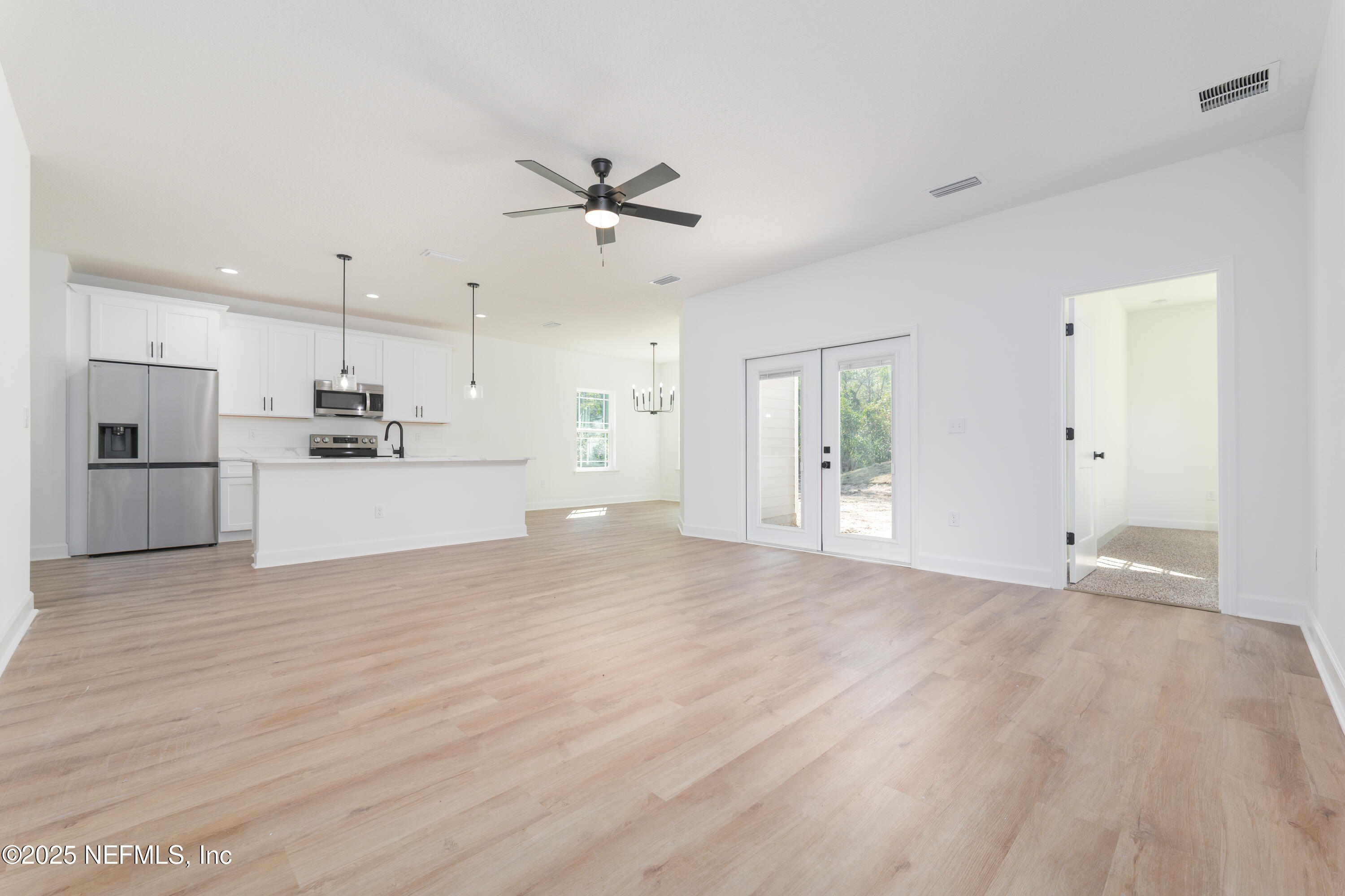 5214 County Road 218 Middleburg, FL 32068 - Photo 7 of 30 a view of a kitchen with a sink and wooden floor