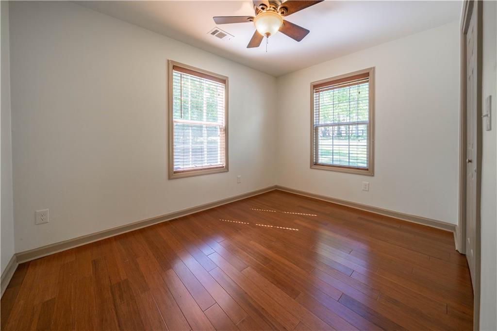 25 Quail Ridge Road Taylorsville, GA 30178 - Photo 15 of 29 a view of an empty room with wooden floor and a window